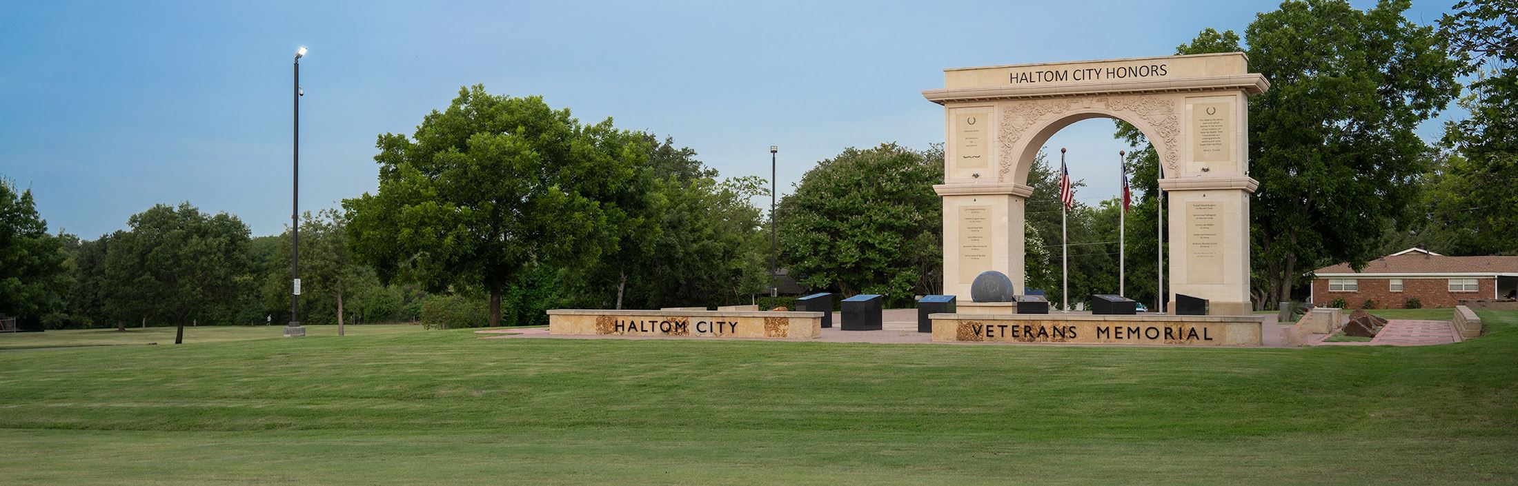 Cleaning professional from The Mop & Broom scrubbing a wall in Westover-Hills, providing quality cleaning services