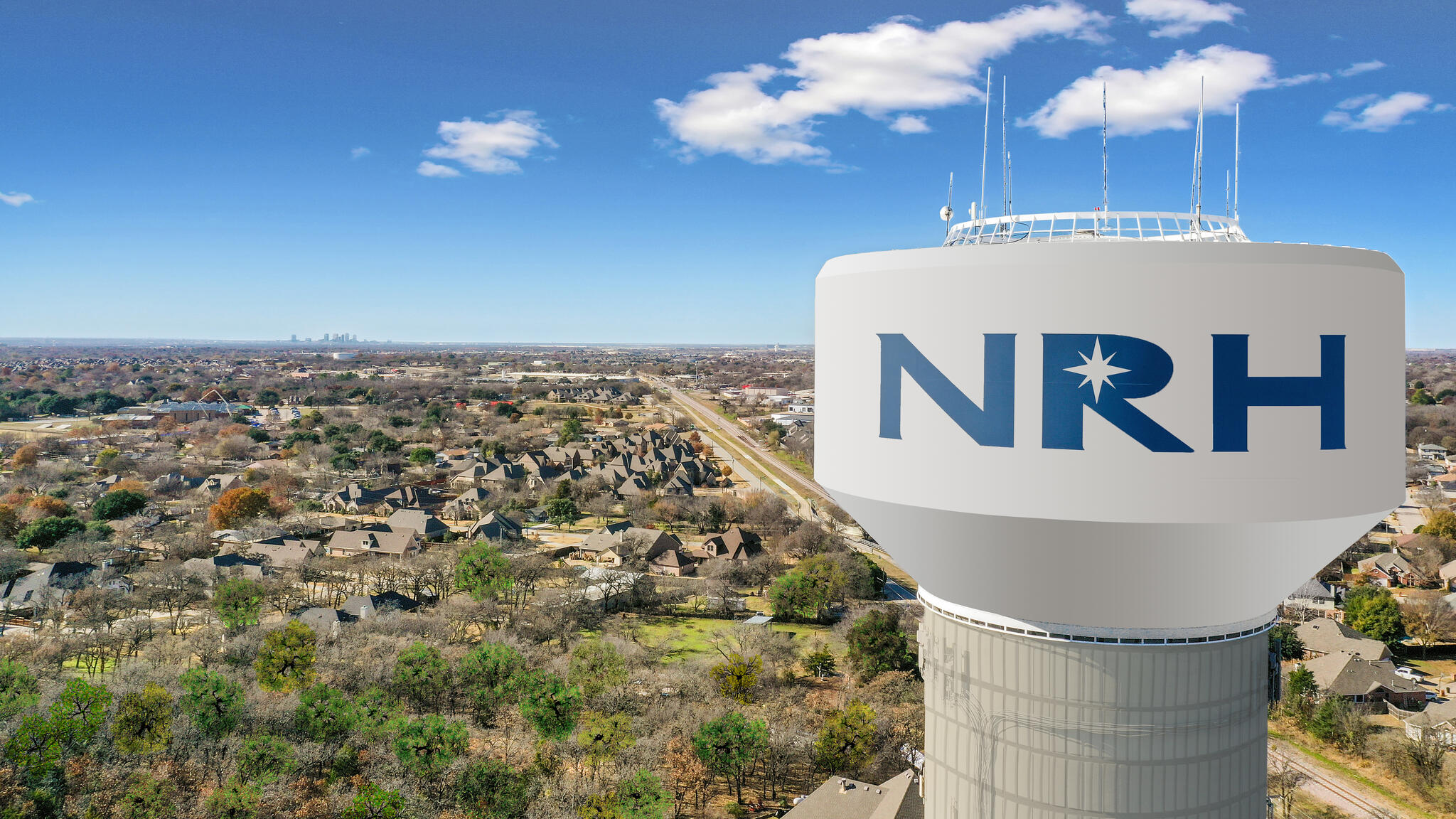 Professional cleaner in White Settlement using a duster for thorough cleaning by The Mop & Broom